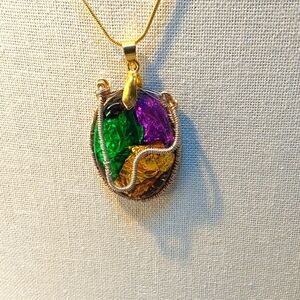 Necklace 18 inches long brass is brass.Silver wiring , an inch and a half